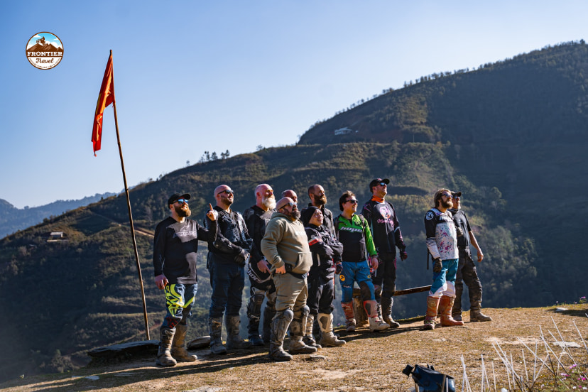 Riders sharing a peaceful moment during a break, emphasizing the bond and mutual respect over competitive racing.